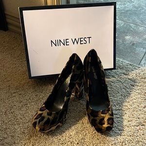 4” heels, wore once. Leopard. Horse hair Exterior.